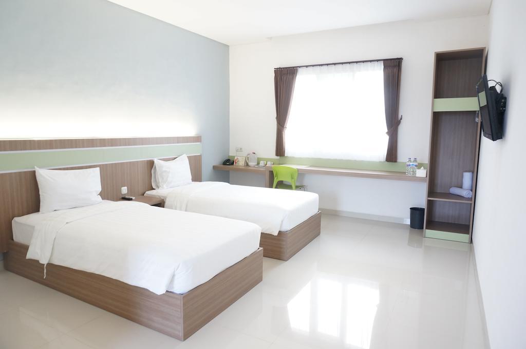 Rumah Cassa Guest House Сурабая Номер фото